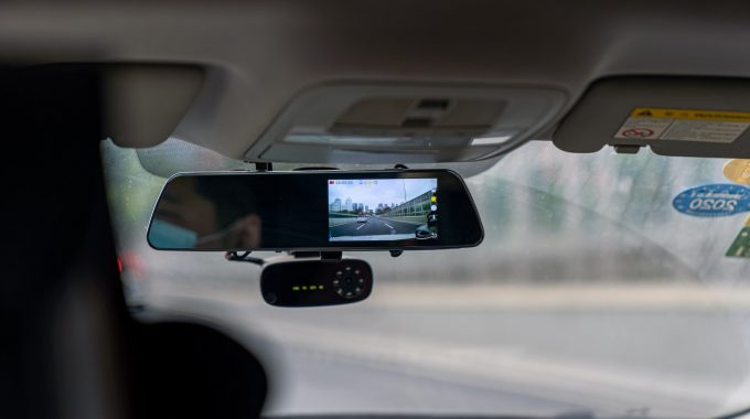 Car Side Mirror With Water Droplets