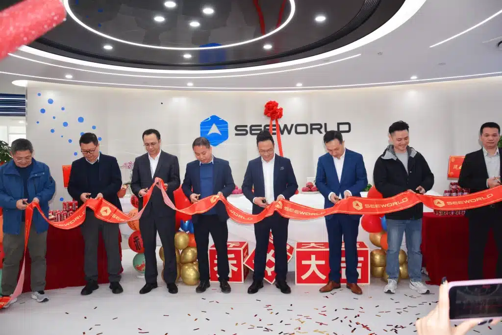 SEEWORLD leadership team cutting the ribbon to inaugurate the new headquarters in Guangzhou